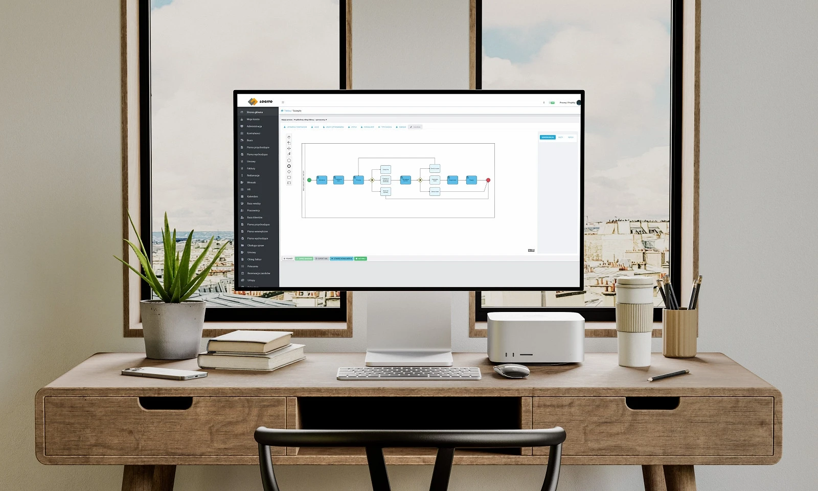 Komputer na biurku jako interpretacja wersjonowania procesów w oprogramowaniu workflow